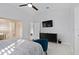 Main bedroom with a large TV and comfortable seating at 2622 Montego Bay Blvd, Kissimmee, FL 34746