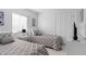 Guest bedroom with twin beds and plenty of closet space at 2622 Montego Bay Blvd, Kissimmee, FL 34746