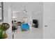 Bright living room featuring contemporary furniture and tile floors at 2622 Montego Bay Blvd, Kissimmee, FL 34746