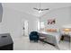 Main bedroom with king bed and en-suite bathroom access at 2622 Montego Bay Blvd, Kissimmee, FL 34746