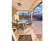 Outdoor patio area with seating and view of the pool at 2622 Montego Bay Blvd, Kissimmee, FL 34746