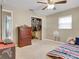 Bedroom with walk-in closet and ceiling fan at 901 Swann Dr, Lakeland, FL 33809