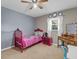 Bedroom with vanity, twin bed, and ceiling fan at 901 Swann Dr, Lakeland, FL 33809