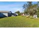 Spacious backyard with playset and trampoline at 1019 Milner E Dr, Lakeland, FL 33810