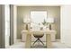 Home office with wood desk, neutral decor, and natural light at 2033 Lasso Loop, Eagle Lake, FL 33839
