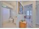 Bright bathroom with shower/tub combo and vanity at 7491 Limonia Dr, Indian Lake Estates, FL 33855