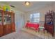 Cozy dining area with table, chairs, and built-in hutch at 7491 Limonia Dr, Indian Lake Estates, FL 33855