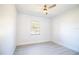 Bright and airy bedroom with new laminate flooring and ceiling fan at 3733 Hill St, Lakeland, FL 33812