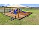 playground with shaded area and play equipment at 4128 Singing Mockingbird Blvd, Bartow, FL 33830