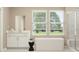 Spa-like bathroom featuring a soaking tub and walk-in shower at 760 Terrapin Dr, Debary, FL 32713