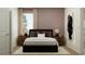 Cozy bedroom with a comfortable bed and nightstands at 760 Terrapin Dr, Debary, FL 32713