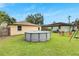 Nice backyard with above ground pool and patio area at 1375 6 Iron Dr, Lakeland, FL 33801