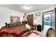 Bedroom with a double bed, Gathering decor and access to another room at 1375 6 Iron Dr, Lakeland, FL 33801