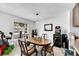 Charming dining room with wood table and chairs, perfect for Gathering meals at 1375 6 Iron Dr, Lakeland, FL 33801