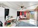 Spacious Florida room with plenty of light at 1375 6 Iron Dr, Lakeland, FL 33801