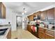 Modern kitchen with stainless steel appliances and granite counters at 1375 6 Iron Dr, Lakeland, FL 33801