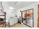 Laundry room with washer, dryer and exterior access at 1375 6 Iron Dr, Lakeland, FL 33801
