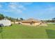 Large backyard with a shed and plenty of green space at 5115 Tillery Rd, Lakeland, FL 33812