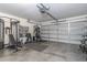 Garage converted into home gym, featuring various exercise equipment at 3301 Enclave Blvd, Mulberry, FL 33860