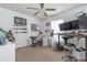 Home office with standing desk and shelving at 3301 Enclave Blvd, Mulberry, FL 33860