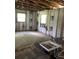 Unfinished interior with exposed framing and new shower at 828 Clark Rd Rd, Lakeland, FL 33815