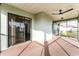 Screened porch with access to interior and backyard at 918 Hillgrove Ln, Auburndale, FL 33823