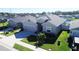 Nice curb appeal of the house with a view of the neighborhood at 6855 Mossy Oak Ln, Lakeland, FL 33810