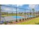 Two community pickleball courts with chain link fence at 6053 Shavasana Rd, Clermont, FL 34714