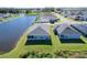 Aerial view of house and lakefront property at 289 Cascara Ln, Auburndale, FL 33823