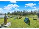 Dog park with agility equipment and water fountain at 4310 Trotters Way, Lakeland, FL 33801