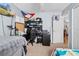 Versatile bedroom with a desk, bed and open view at 2986 Sw 143Rd Place Rd, Ocala, FL 34473