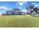 Cute blue house with a spacious yard, great curb appeal at 2986 Sw 143Rd Place Rd, Ocala, FL 34473