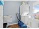 Laundry room with washer, dryer, and utility sink at 2986 Sw 143Rd Place Rd, Ocala, FL 34473