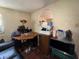 Small kitchen area with microwave and mini-fridge at 1228 35Th Nw St, Winter Haven, FL 33881