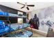 bedroom with Star Wars themed bunk beds and wall mural at 7650 Fairfax Dr, Kissimmee, FL 34747