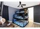 Star Wars themed bedroom with a triple bunk bed at 7650 Fairfax Dr, Kissimmee, FL 34747