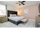 Elegant bedroom with plush bed and soft color palette, creating a tranquil atmosphere at 7650 Fairfax Dr, Kissimmee, FL 34747