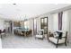 Spacious dining room with a large table and seating for ten at 7650 Fairfax Dr, Kissimmee, FL 34747