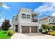Beautiful two-story home with two-car garage and well-manicured lawn at 7650 Fairfax Dr, Kissimmee, FL 34747