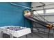 Fun game room with foosball and basketball game at 7650 Fairfax Dr, Kissimmee, FL 34747
