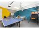 Game room features ping pong and basketball game at 7650 Fairfax Dr, Kissimmee, FL 34747