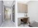 Home office with built-in desk and cabinets at 7650 Fairfax Dr, Kissimmee, FL 34747