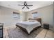 Spacious bedroom with a king-size bed and ceiling fan at 1540 Dolphin Dr, Lakeland, FL 33801