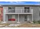Back exterior showing a patio and balcony at 7340 Daniel Webster Dr # 6, Winter Park, FL 32792