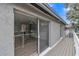 Private deck with wood composite flooring and sliding glass doors at 7340 Daniel Webster Dr # 6, Winter Park, FL 32792