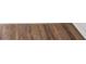 Wood-look vinyl flooring in a light brown tone at 7340 Daniel Webster Dr # 6, Winter Park, FL 32792