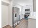 Bright kitchen with updated stainless steel appliances and light grey cabinets at 7340 Daniel Webster Dr # 6, Winter Park, FL 32792