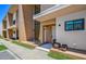 Modern townhome with light brown and beige facade at 7482 Brooklyn Dr, Kissimmee, FL 34747