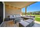 Covered patio with comfortable seating and a view of the community at 7482 Brooklyn Dr, Kissimmee, FL 34747