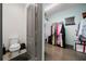 Large walk-in closet with ample storage space at 9406 Dugard Ct, Orlando, FL 32827